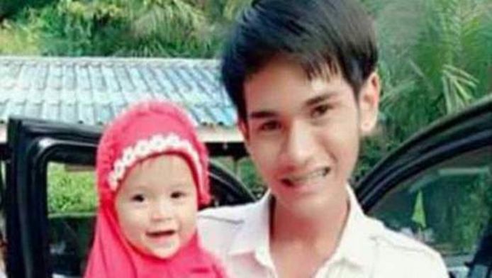 Wuttisan Wongtalay en zijn dochtertje Beta