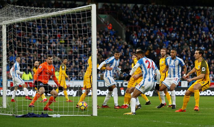 Soccer Football - Premier League - Huddersfield Town vs Brighton & Hove Albion - John Smith’s Stadium, Huddersfield, Britain - December 9, 2017   Huddersfield Town’s Steve Mounie scores their first goal    Action Images via Reuters/Ed Sykes    EDITORIAL USE ONLY. No use with unauthorized audio, video, data, fixture lists, club/league logos or "live" services. Online in-match use limited to 75 images, no video emulation. No use in betting, games or single club/league/player publications. Please contact your account representative for further details.