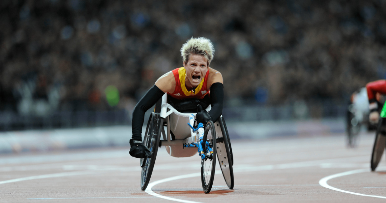 Rolstoelatlete Marieke Vervoort wint de 100 meter op de Olympische Spelen van Londen in 2012. Beeld rv