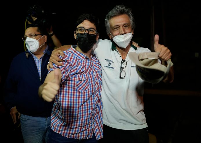 Opposition leader Freddy Guevara, left, gestures with his father, Freddy Guevara, upon his arrival to his residence after he was released in Caracas, Venezuela, Sunday, Aug. 15, 2021.  (AP Photo/Ariana Cubillos)