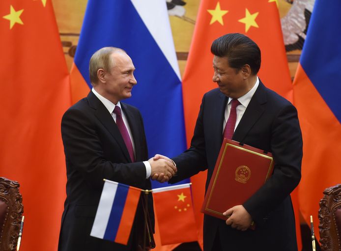 Poetin tijdens een officieel bezoek in 2016 aan Xi Jinping in Peking, om te praten over onder meer economische samenwerking