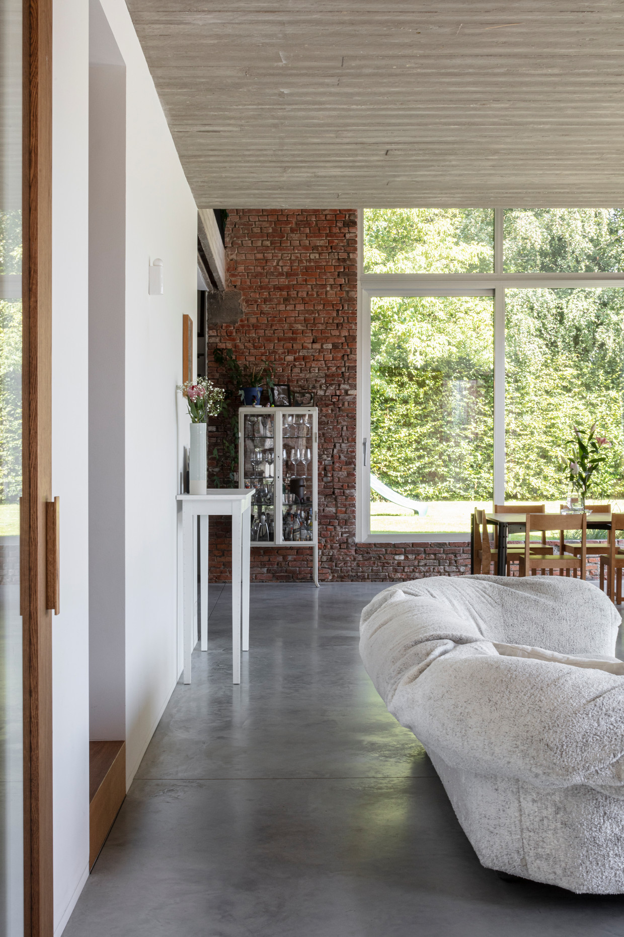 You have a view of the garden from every corner of the house.  Tim van de Velde's photo