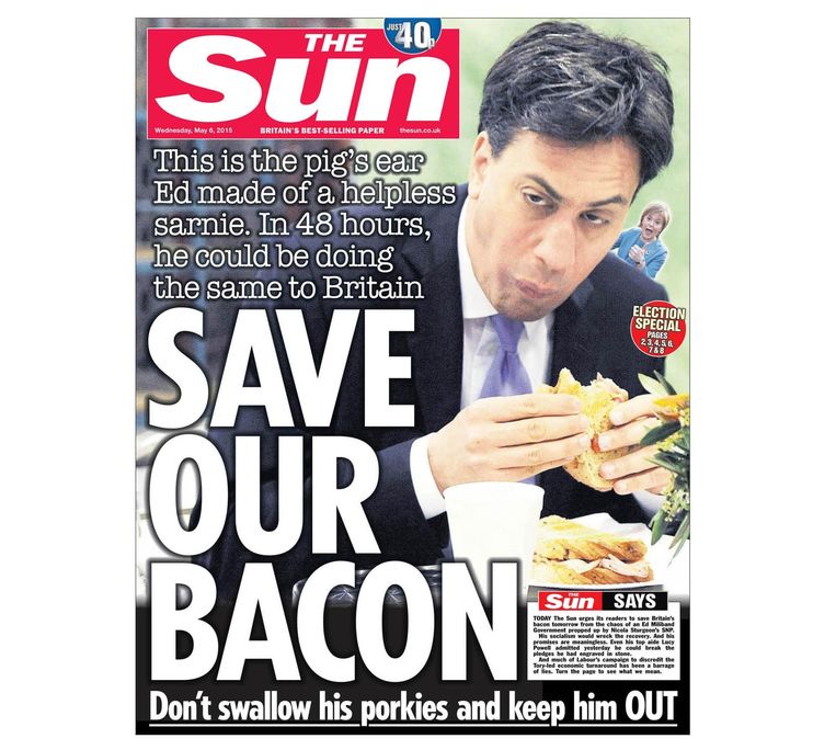 Een dag voor de parlementsverkiezingen van 2015 plaatst The Sun de foto op hun voorpagina, begeleid door de tekst ‘Save Our Bacon’. Beeld rv