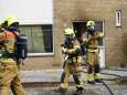Brandweer redt kat uit woning bij keukenbrand in Dongen, veel schade