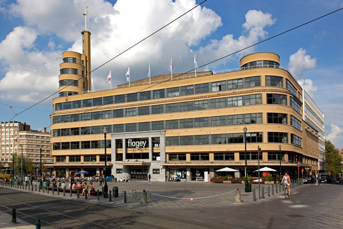 The House of the Radio / Former 'INR' (Institut National de Radiodiffusion), at Flagey Square, Ixelles / Elsene (Commune), Brussels (Capital City & Region), Belgium.

The House of the Radio at Flagey is best known as the Former 'INR' (Institut National de Radiodiffusion) (NIR). Its building was established in 1938 by the Belgian architect Joseph Diongre. The new building marked the end of Belgian radio's pioneering years, offering with its Äúsound factoryÄù, one of the first broadcasting buildings in Europe. From the moment of its inauguration, the steamboat won international acclaim. The inherent qualities of the studios (especially Studio 4) were praised throughout the world and attracted the most prestigious musicians of the century (classical, contemporary and jazz) for concerts and festivals as well as for recordings. From the beginning, the history of the building was associated with radiophonic and musical productions and beginning in 1953 it also witnessed the arrival of television, the new medium that would subsequently enjoy an enormous expansion. Thus for more than thirty years, the NIR was the audiovisual centre par excellence. When the original owners left the building in 1974, various cultural institutions took up residence until 1995, giving it an added dimension.
In 1997, a workgroup made up of prominent figures from the private and the cultural sectors began elaborating a rescue plan for the former NIR building with a view toward its restoration and giving it a new purpose. On 30 June 1998, ownership of this exceptional piece of architectonic heritage passed to the public limited company Maison de la Radio Flagey which was established with capital of 47 million euro. The fact that thirty Belgian companies worked together to save a threatened masterpiece and to return it to its original splendour was a first for Belgium.