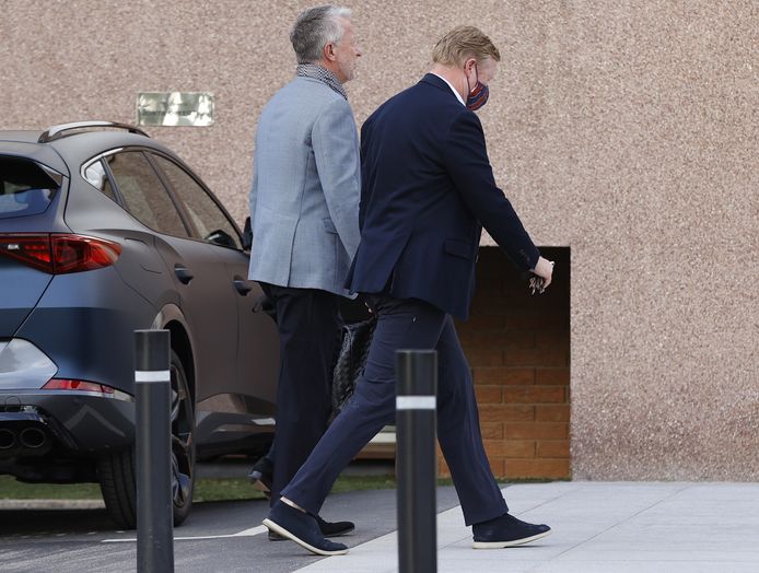 Ronald Koeman (r) samen met zijn zaakwaarnemer Rob Jansen.