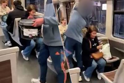 KIJK. Youtuber kiepert emmer met hondenuitwerpselen en olie leeg over passagier in Brusselse metro