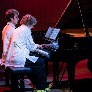 Grand pianos stood where trucks normally unload at the Ragged Music Festival