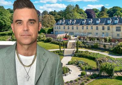 BINNENKIJKEN. Robbie Williams zet Engels landhuis te koop voor bijna 8 miljoen euro