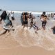 Open riool of niet, in Durban wordt vrolijk gezwommen