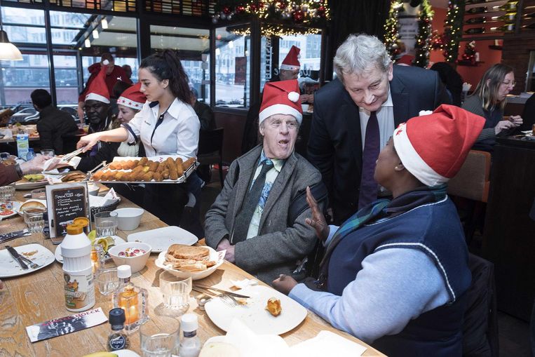 Tijdens een ontbijt met dak- en thuislozen, december 2016. Beeld ANP