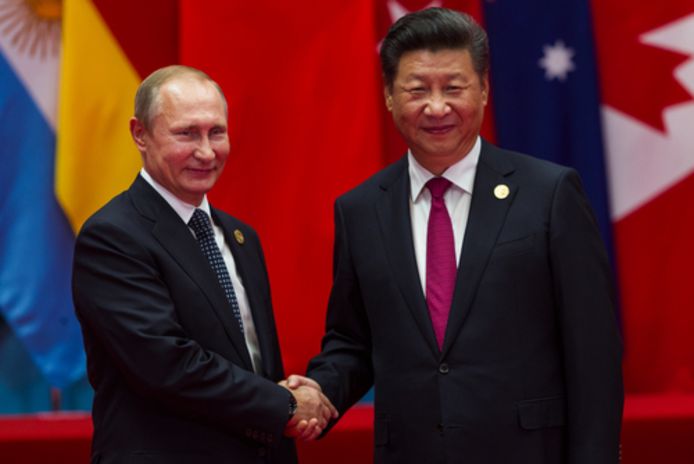 De Russische president Vladimir Poetin en de Chinese president Xi Jinping.