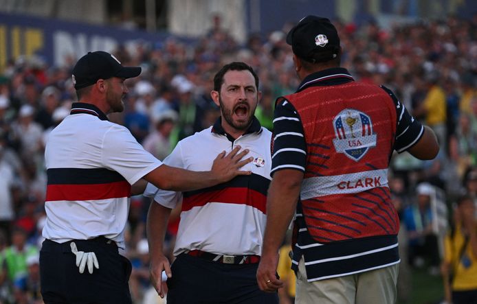 Patrick Cantlay (center) celebrates after a beautiful birdie with his partner Clark.