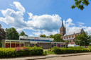 Het voormalige dorpshuis De Hanze in Maasbommel.