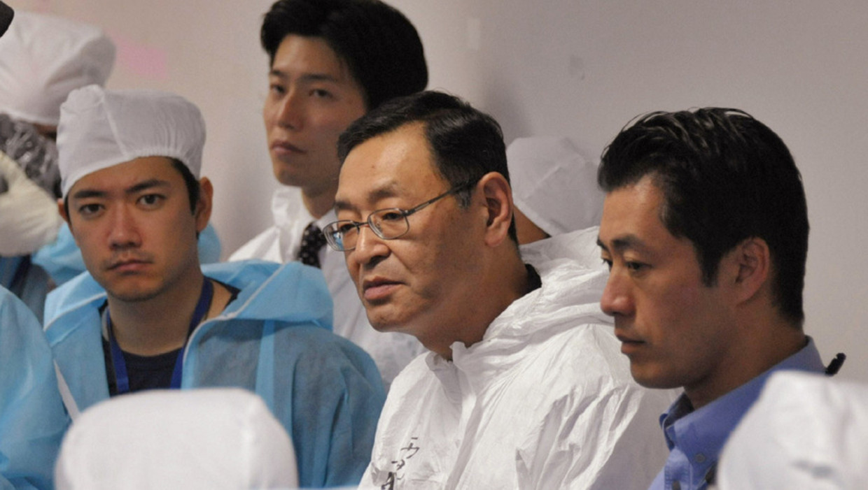 Masao Yoshida (midden) in november 2011. Beeld afp