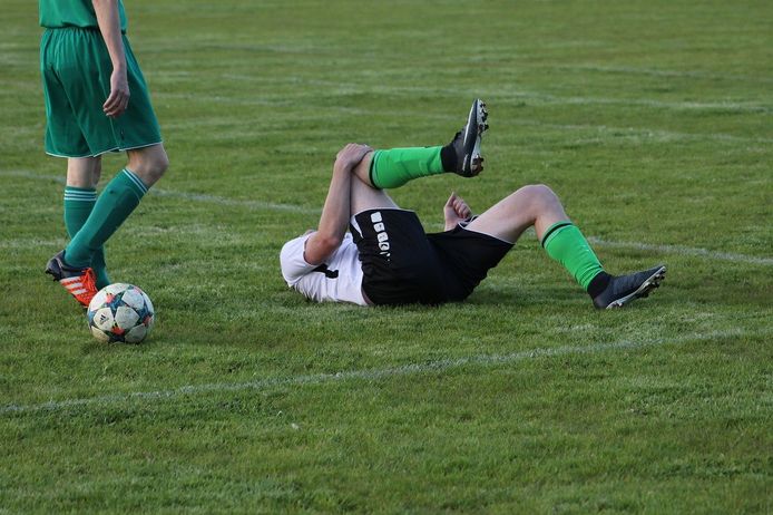 Blessure op voetbalveld, foto ter illustratie.
