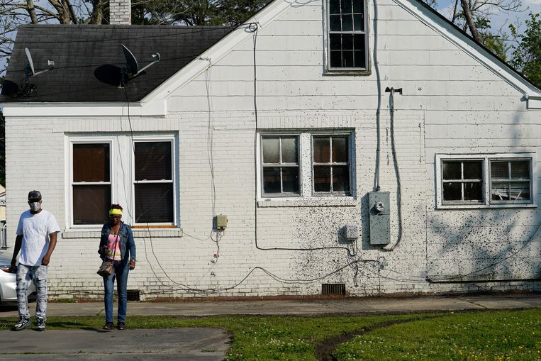 Het huis waar de politie een huiszoeking wilde doen. Beeld AP