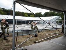 Eerste Afghanen komen pas dinsdag aan in Heumensoord, bouw van opvang ligt op schema