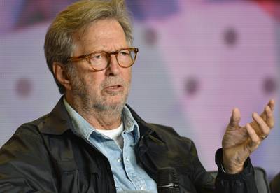 Eric Clapton sleept vrouw voor de rechter... voor illegale cd van 10 euro
