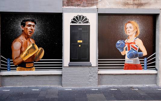 A new mural depicting the two Conservative leaders, Rishi Sunak and Liz Truss, appears on a wall in central Belfast, Northern Ireland.