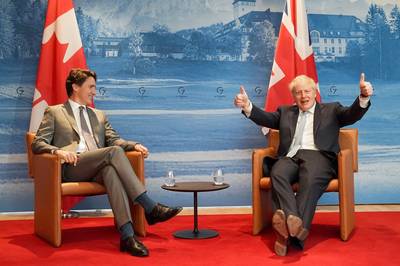 Trudeau en Johnson grappen over Poetin tijdens G7