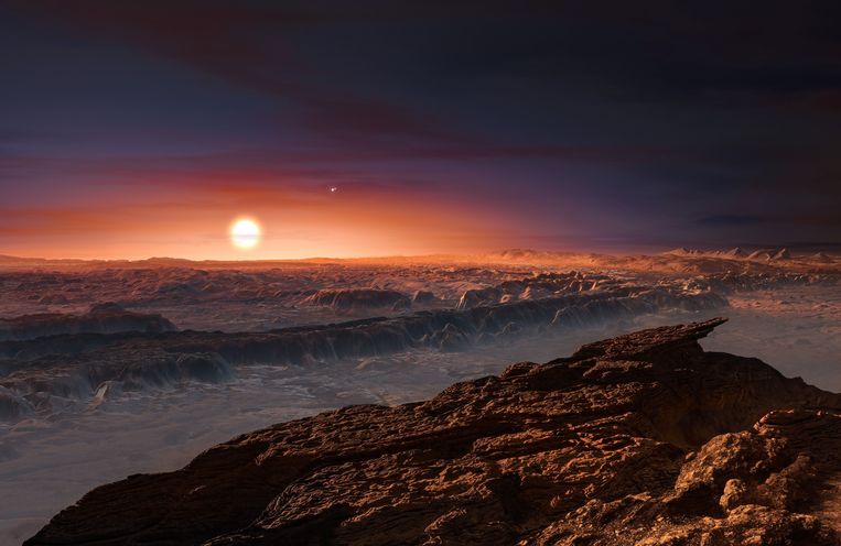 Een artiestenimpressie van de planeet Proxima B, die rond de rode dwerg Proxima Centauri cirkelt. Beeld AFP