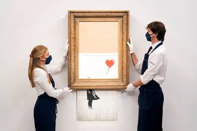 Volg hier live de veiling van Banksy’s iconisch kunstwerk ‘Love is in the Bin’