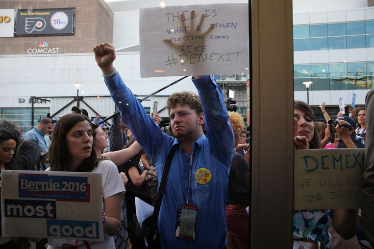 Supporters of Sen. Bernie Sanders' presidential campaign protest during the Democratic National Convention in Philadelphia, July 26, 2016. Some of the 60,000 emails stolen by Russian hackers from the email account of John Podesta, Hillary Clinton's campaign chairman, infuriated Sanders delegates as they arrived in Philadelphia.  Beeld Ruth Fremson/The New York Times