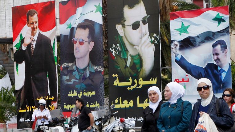 Verkiezingsposters van president Assad in de hoofdstad Damascus. Beeld REUTERS
