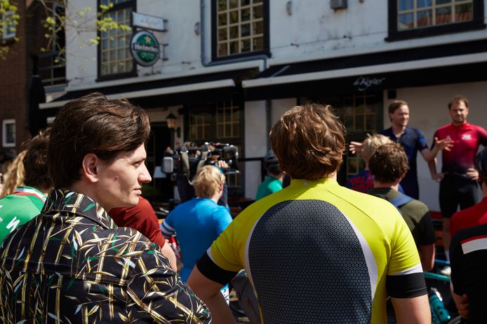 Tim Zuidberg (left) listens to the instructions about the bike ride.