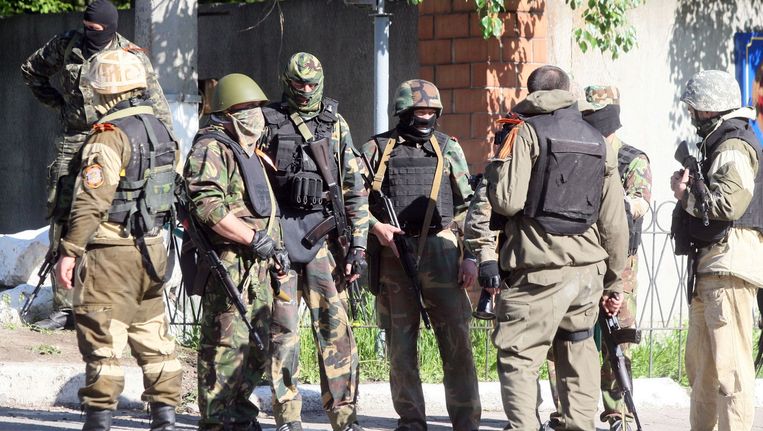 Gewapende pro-Russische militanten in Donetsk. Beeld afp