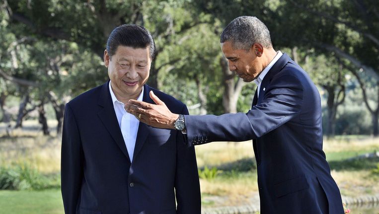 De Chinese president Xi Jinping, de opvolger van Hu Jinatao, en de Amerikaanse president Barack Obama. Beeld AFP