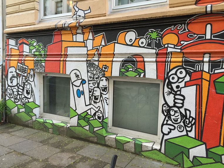 Gebouwen met graffiti en street art zijn er volop in Harmburg, zoals hier in de wijk Sankt Pauli. Foto: Steve Watkins Beeld RV