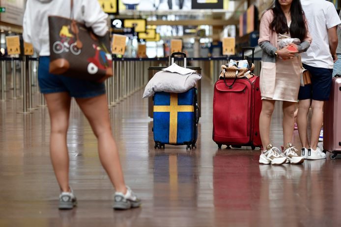 Toeristen op het vliegveld van de Zweedse hoofdstad Stockholm.
