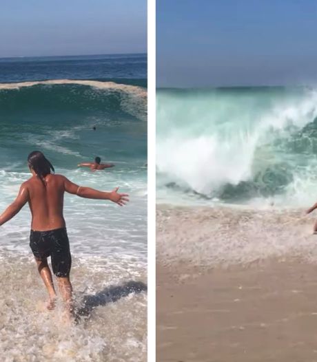 Des baigneurs profitent de vagues énormes au Brésil