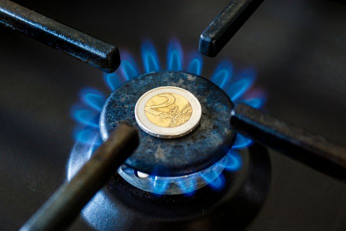 Increase in the cost of the gas bill - euro coin and gas stove turned on