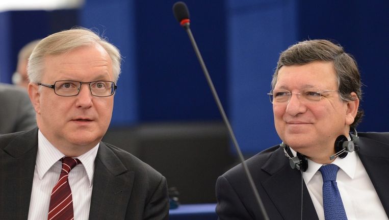 Begrotingscommissaris Olli Rehn en EC-voorzitter Jose Manuel Barroso. Beeld ANP