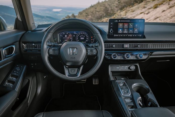 The interior of the Honda Civic e:.