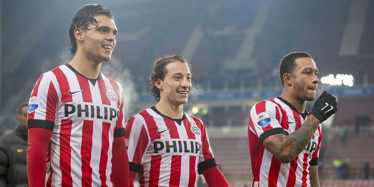 PSV-spelers Karim Rekik, Andres Guardado en Memphis Depay (vlnr) na de zege op Willem II. Beeld epa