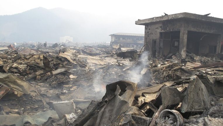 Foto van wat er over is van Otsuchi, na de verwoestende aardbeving en tsunami. Beeld epa