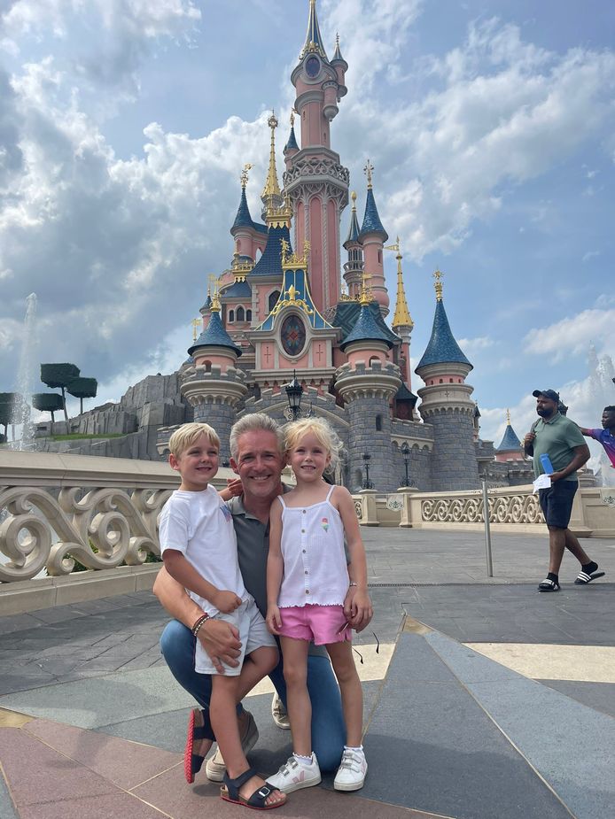 Christophe with his nephew and Lisa Marie in front of Sleeping Beauty Castle