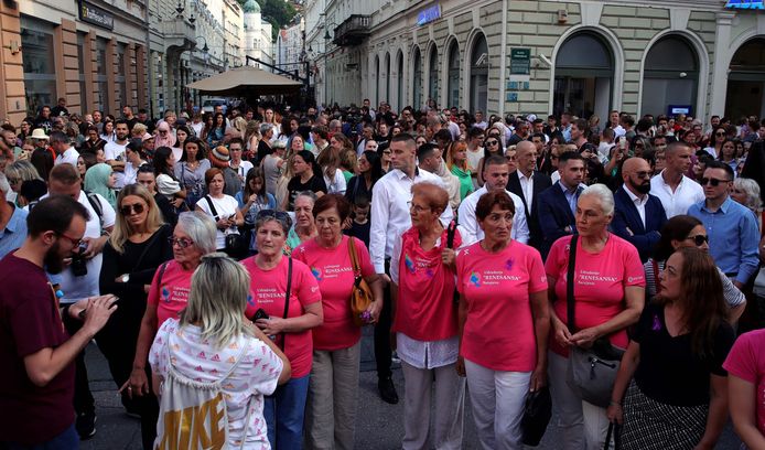 Thousands of people take part in a march in Sarajevo, on August 14, 2023, to show solidarity two days after a woman was murdered by her partner who livestreamed her killing on social media before killing two men and himself. Protesters held up placards emblazoned with messages such as "Stop femicide", "Say no to violence" and "Silence is complicity". (Photo by ELVIS BARUKCIC / AFP)