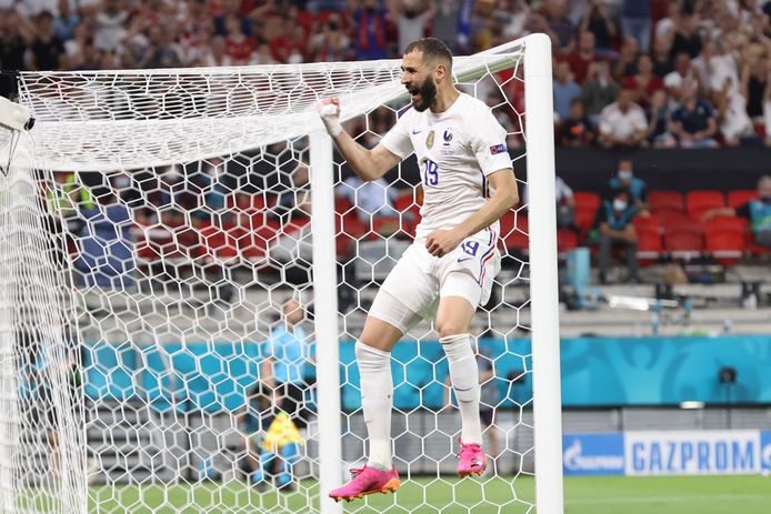 France's Karim Benzema celebrates after scoring his side's first goal during the Euro 2020 soccer championship group F match between Portugal and France at the Puskas Arena in Budapest, Wednesday, June 23, 2021. (Bernadett Szabo, Pool photo via AP)