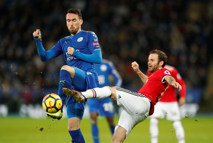 Soccer Football - Premier League - Leicester City vs Manchester United - King Power Stadium, Leicester, Britain - December 23, 2017   Leicester City's Christian Fuchs in action with Manchester United's Juan Mata    Action Images via Reuters/Andrew Boyers    EDITORIAL USE ONLY. No use with unauthorized audio, video, data, fixture lists, club/league logos or "live" services. Online in-match use limited to 75 images, no video emulation. No use in betting, games or single club/league/player publications.  Please contact your account representative for further details.