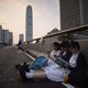 Als CY Leung opstapt gaan we allemaal weer de straat op