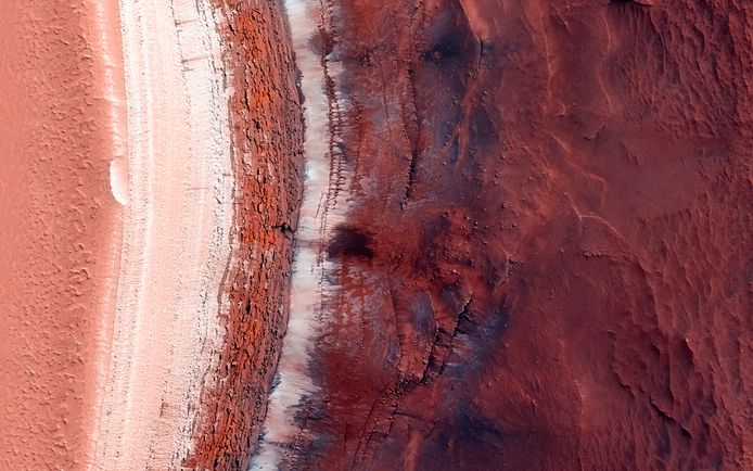The signals that scientists see are consistent with those of the polar caps of Mars, which are known to be very rich in ice