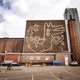 Muurschildering van Keith Haring komt na 30 jaar weer tevoorschijn in Amsterdam