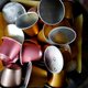 Aluminium cupje doet bittere koffiestrijd tussen Nespresso en Douwe Egberts weer oplaaien
