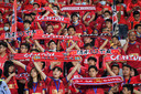 Fans bij de wedstrijd Guangzhou FC - Guangzhou City in de Chinese Super League op 20 april.