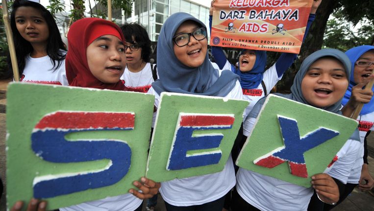 Indonesische studenten tijdens een demonstratie tegen HIV in 2011. Beeld afp